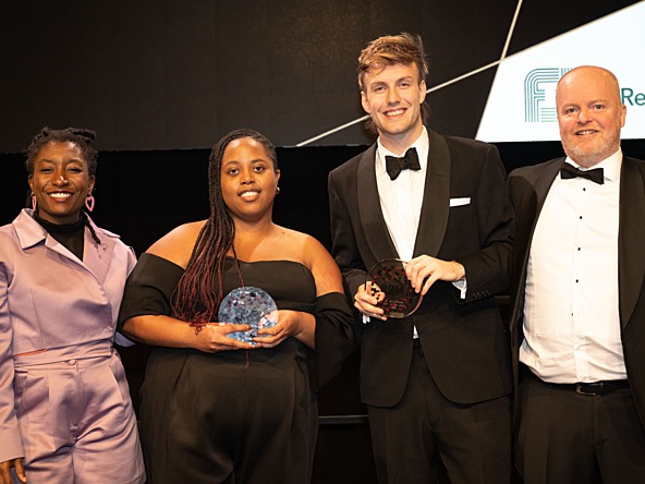 LaShanda Seaman and Joshua Proctor collecting their awards for Young Researcher of the Year - Agency - on stage at the MRS Awards 2023.
